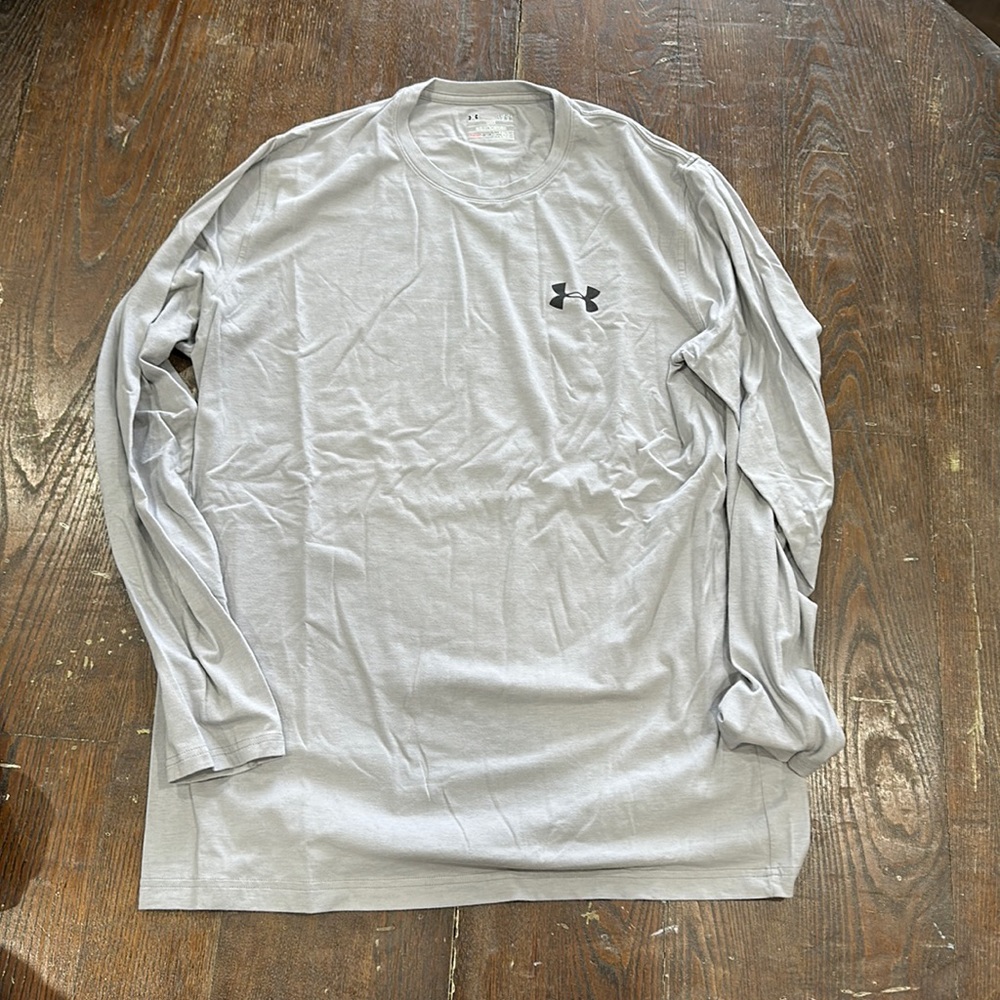 Long sleeve Under Armour stretch fabric shirt. Worn a time or two.